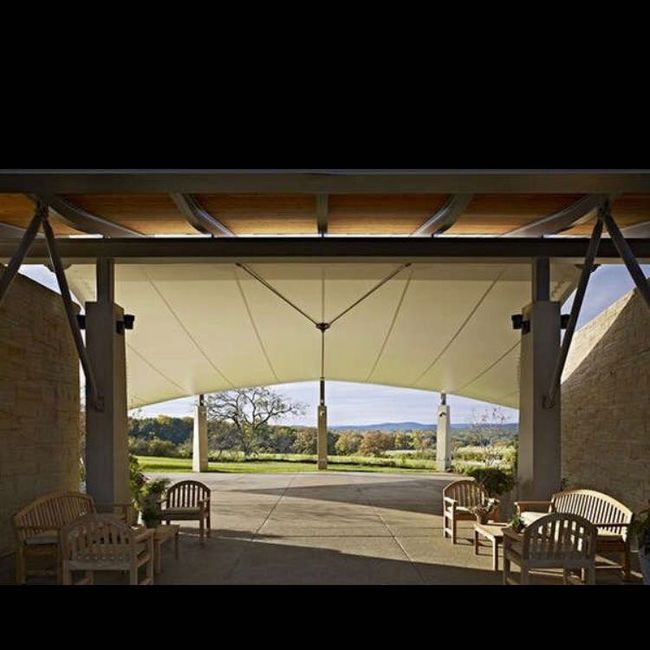 Ideas on how to hide an ugly pole at our ceremony location?? 1