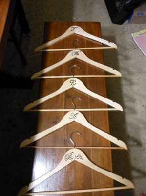My DIY hand painted monogram hangers...Had to share! =)