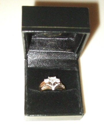 Wedding rings to accommodate your e-ring? Mismatched... princess cut...