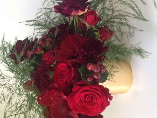 Today we got our marriage license, AND saw sample centerpieces! (pic enclosed)