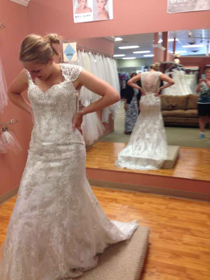 Show me your wedding dresses, and tell me where they are from,and the cost? :)