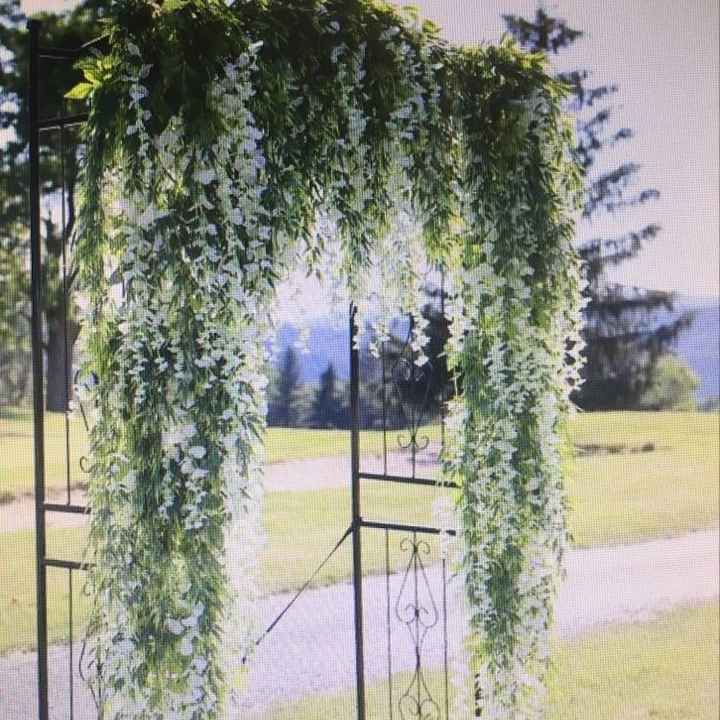 Can I see pics of your aisle/ceremony decor and wedding arbors?