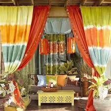 How do I hang curtains outdoors on my porch?
