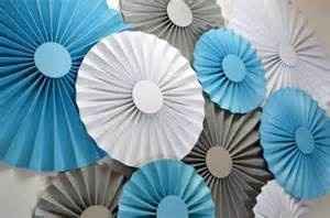 Does anyone know how to glue rosettes on top of each other for backdrop?