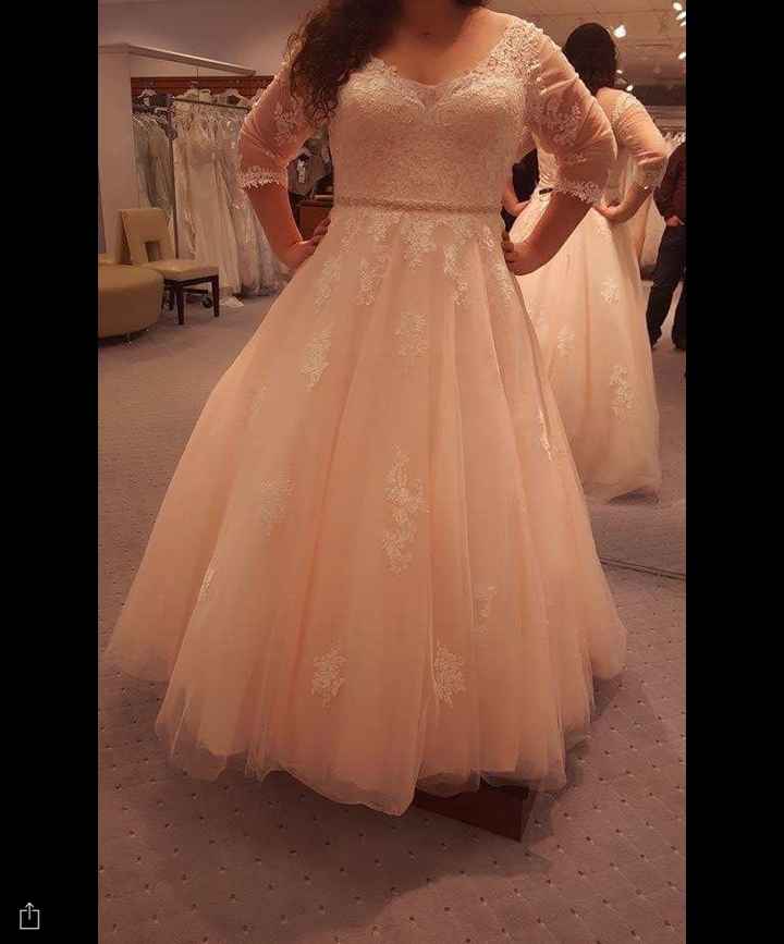 This ball gown accentuates my waist, keeps my bust looking perky without undergarments, and makes my