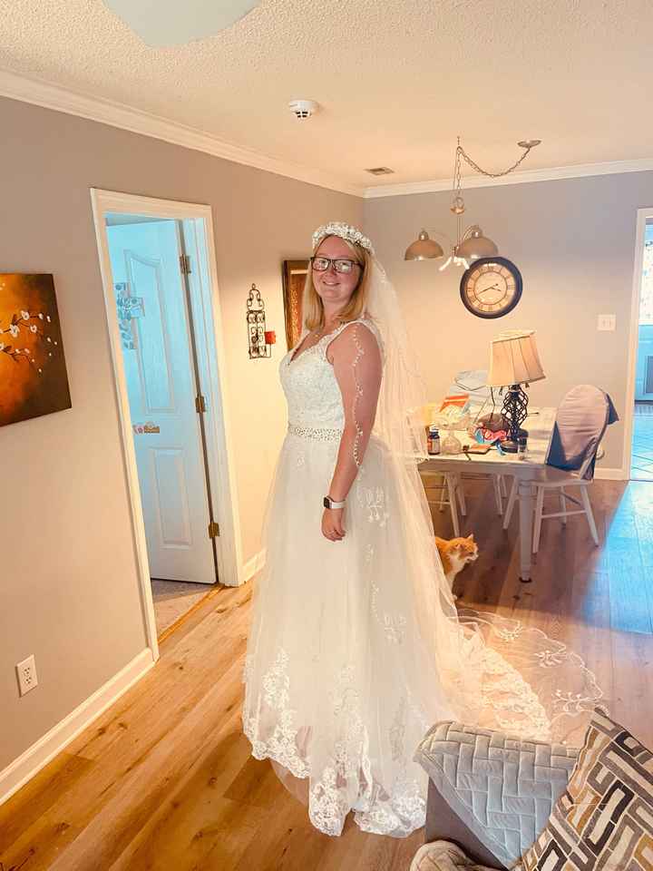 How many dresses did you try on before you found the one? - 1