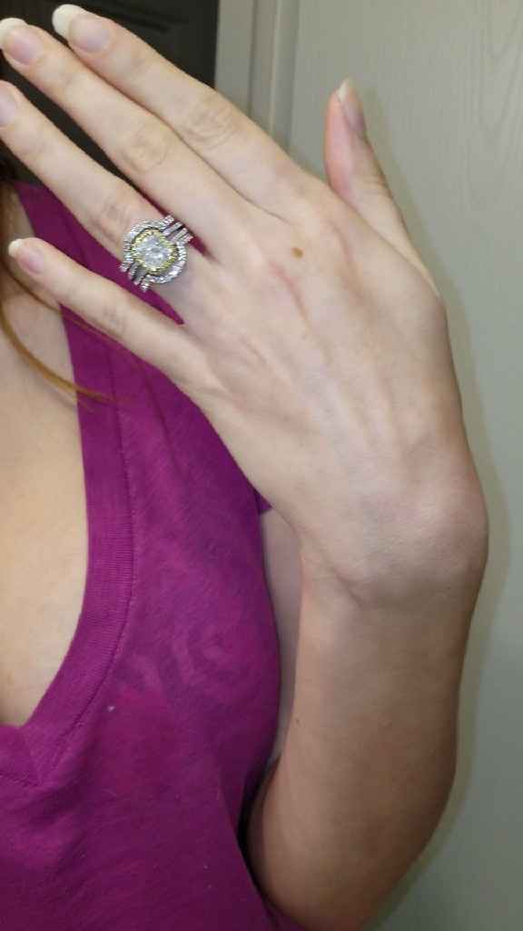 i know this enhancer is gaudy to some people (getting a custom one made). But i like my ring huge an