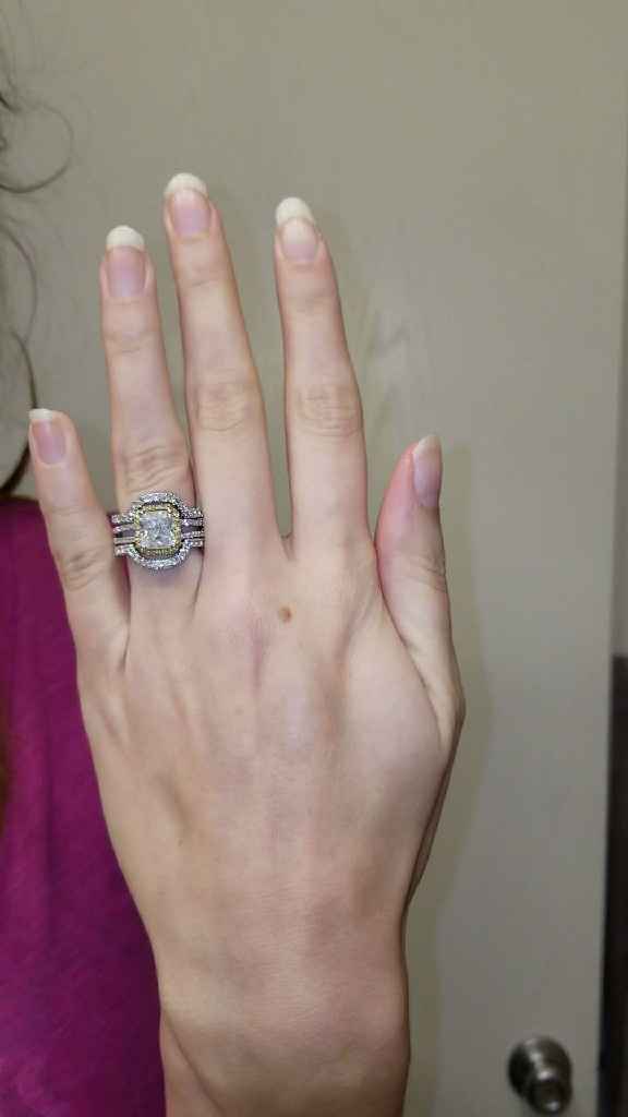 i know this enhancer is gaudy to some people (getting a custom one made). But i like my ring huge an