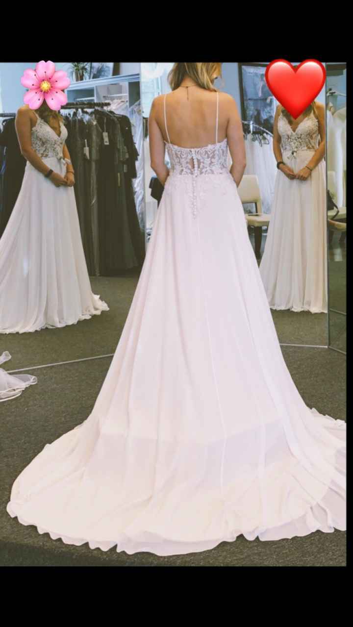 Back of the dress and you can see it for the most part in the mirror.. I will try to dress it up may