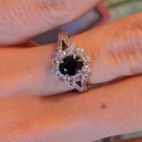 Sapphire surrounded by diamonds 