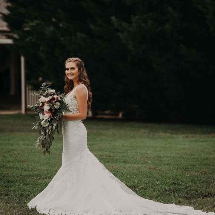 Who is your wedding dress designer? - 3