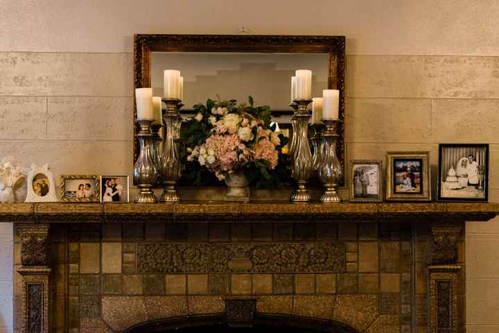 Displaying family members wedding photos at wedding - 3