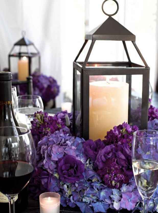 get silver lanterns, use faux flowers or plum petals around base