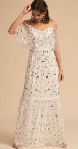BHLDN. Not long sleeves and $390 but pretty!