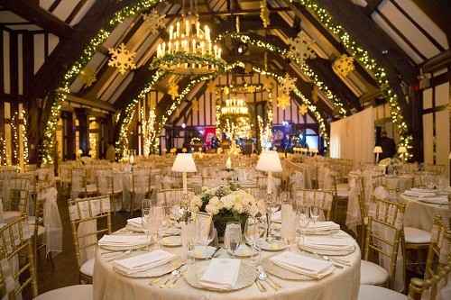 warm winter with greenery/gold/white & lights