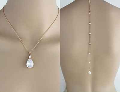 (remove front pendant or find smaller. No bling). But if you wear your hair up, a gold back necklace