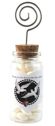 buy jars with cork top and stick a name card holder in it