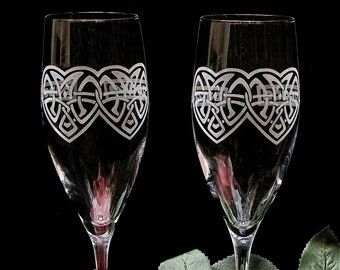 Toasting flutes, invites, cake server with Celtic symbols.