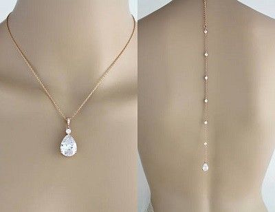 (remove front pendant or find smaller. No bling). But if you wear your hair up, a gold back necklace