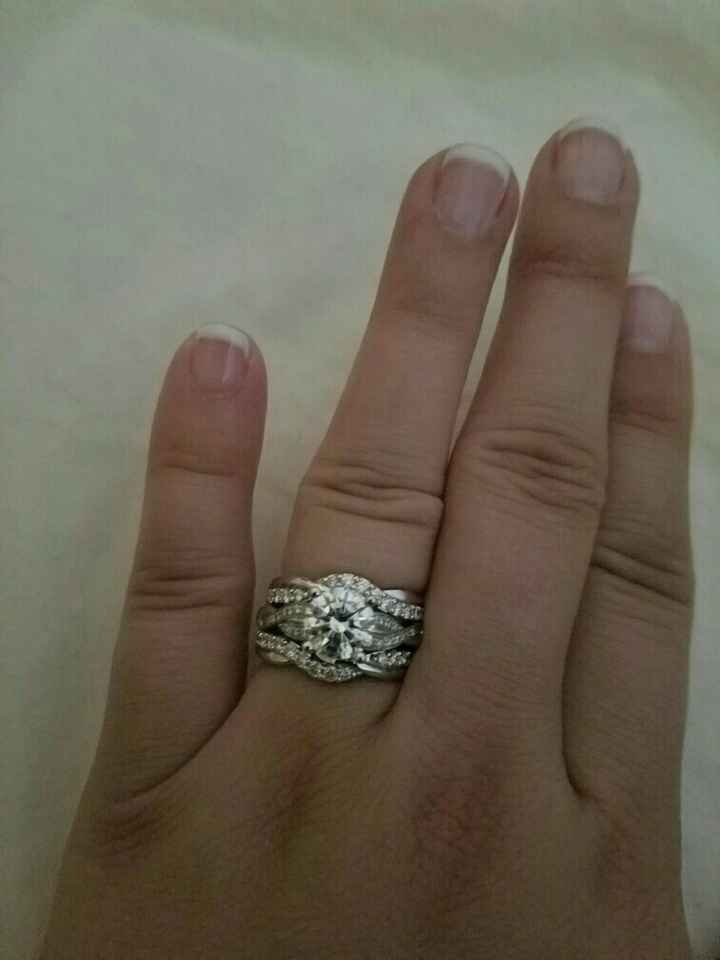 Does anyone have a twisted band diamond engagement ring? And what kind of wedding band did you get?