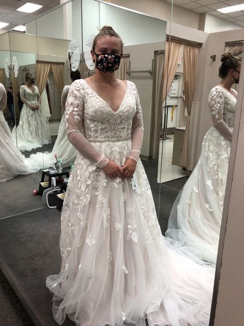 Help! For the life of me, i cannot get my wedding dress to stay on a hanger. 1