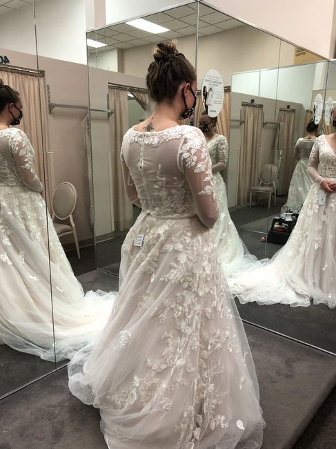 Help! For the life of me, i cannot get my wedding dress to stay on a hanger. - 2
