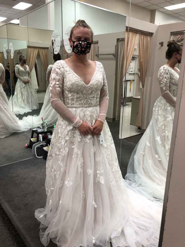 Help! For the life of me, i cannot get my wedding dress to stay on a hanger. - 1