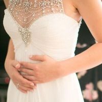 Who's NOT wearing white or ivory?