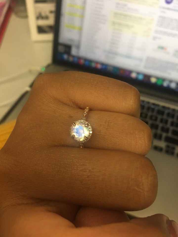 a close up - it's moonstone (my birthstone) with a diamond halo and band. 