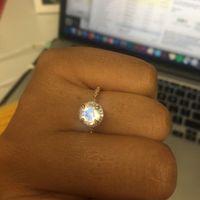 a close up - it's moonstone (my birthstone) with a diamond halo and band. 