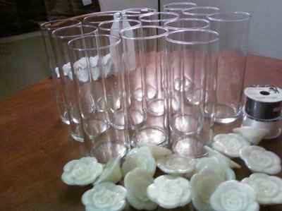 Vases and Floating Candles and ceremony programs