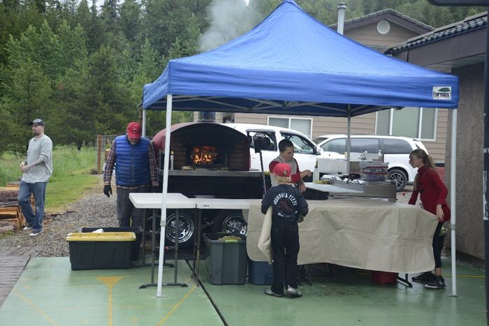 Pizza set up. They brought the food down to us because of the rain.