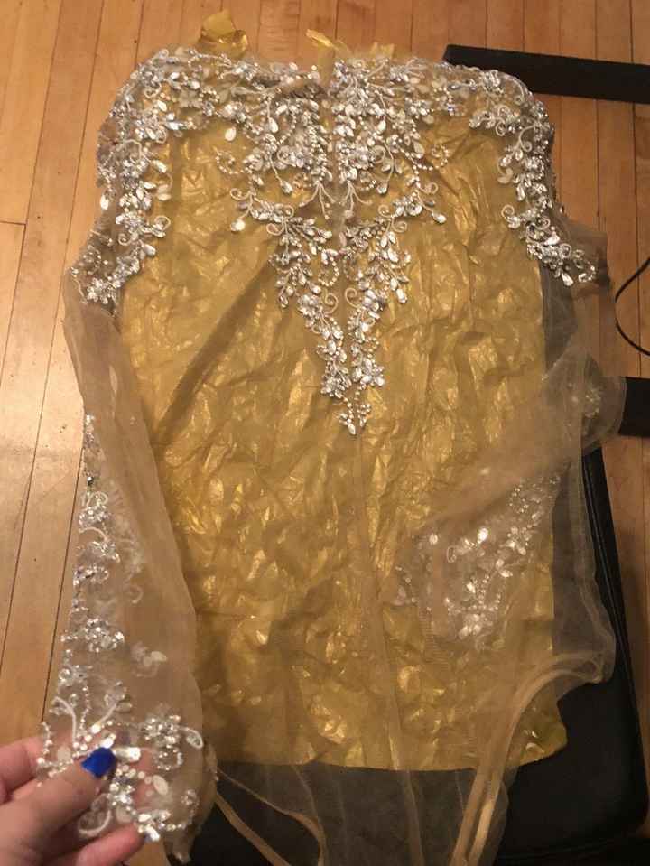 Back of the bejeweled bodysuit