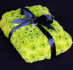 A pillow or a ________ for your ceremony rings?