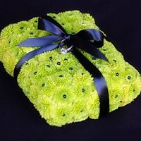 A pillow or a ________ for your ceremony rings?