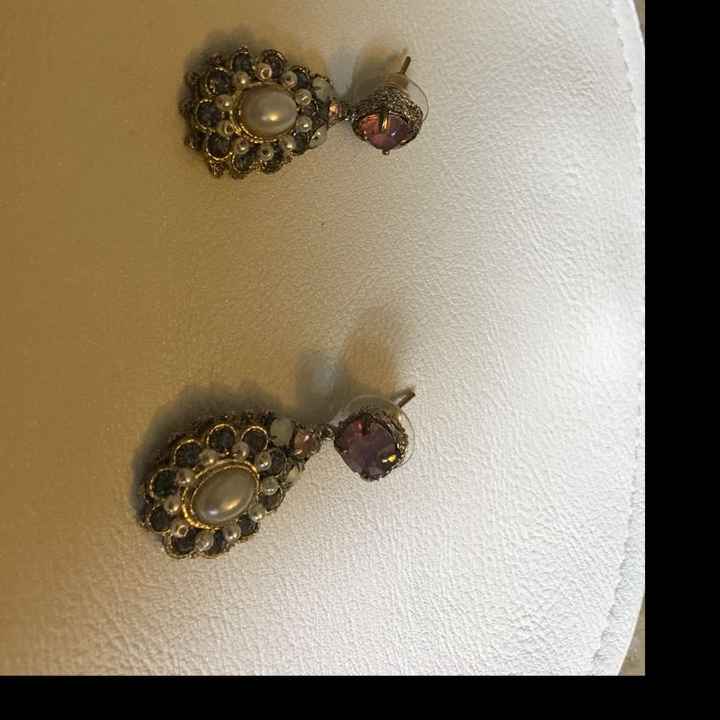 What jewelry is everyone wearing? - 1