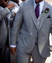 FH is wearing a Grey tux