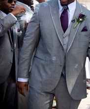 FH is wearing a Grey tux