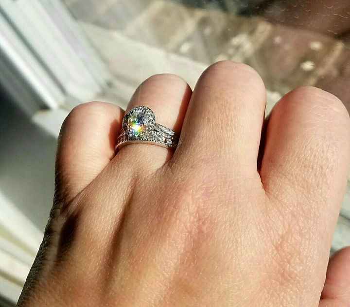 CZ wedding band with a diamond engagement ring?
