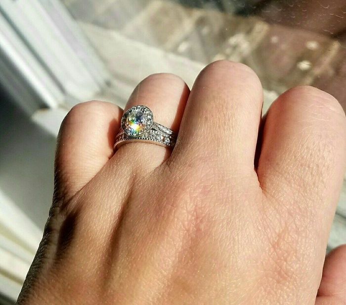 CZ wedding band with a diamond engagement ring?
