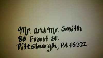 addressing invitations/and sending them off