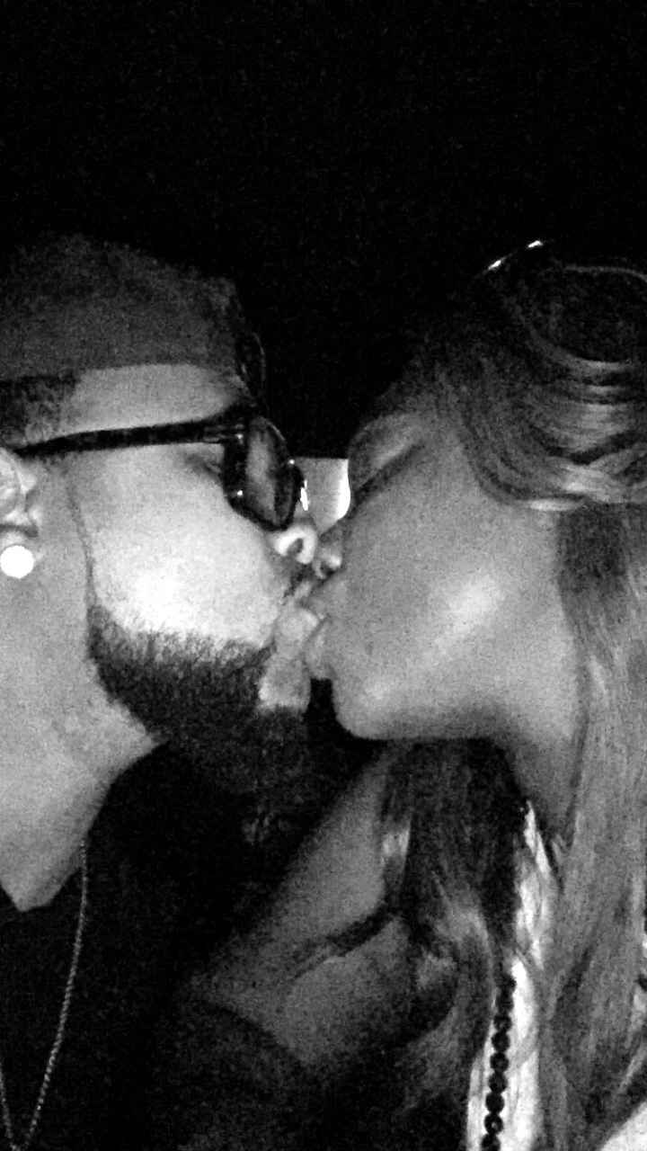 One of our first kisses. Never knew that this would be us. We had known each other since high school