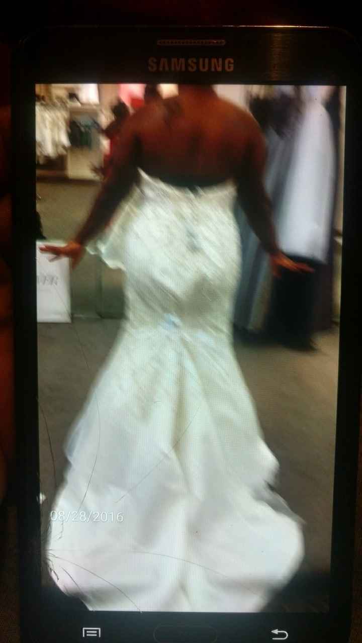 Which gown look better