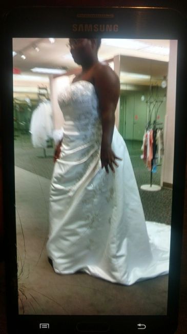 Which gown look better