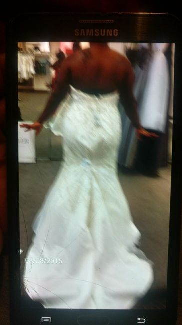 Which gown look better