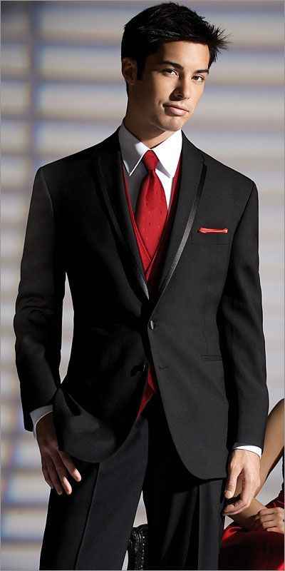 or red vest and tie with white flower