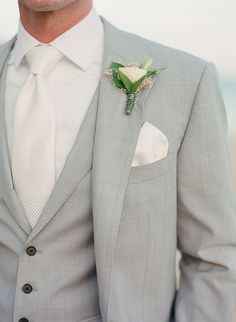 Ivory tie with light grey suit. 