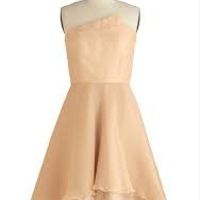 Grooms Grandmother bought a cream dress for wedding