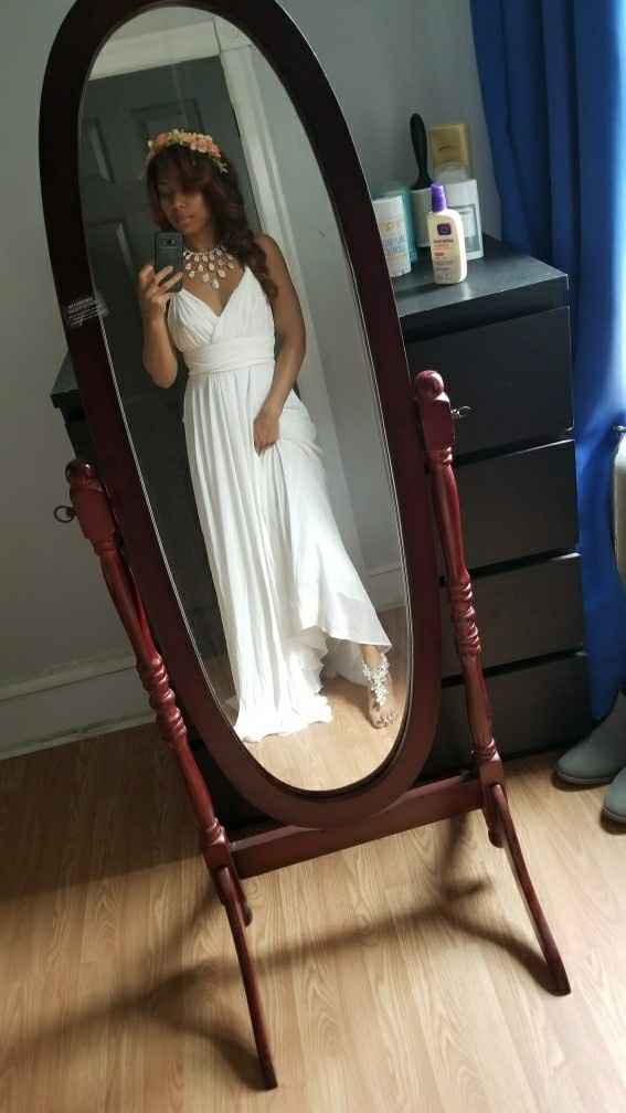 What do you think of my wedding dress?