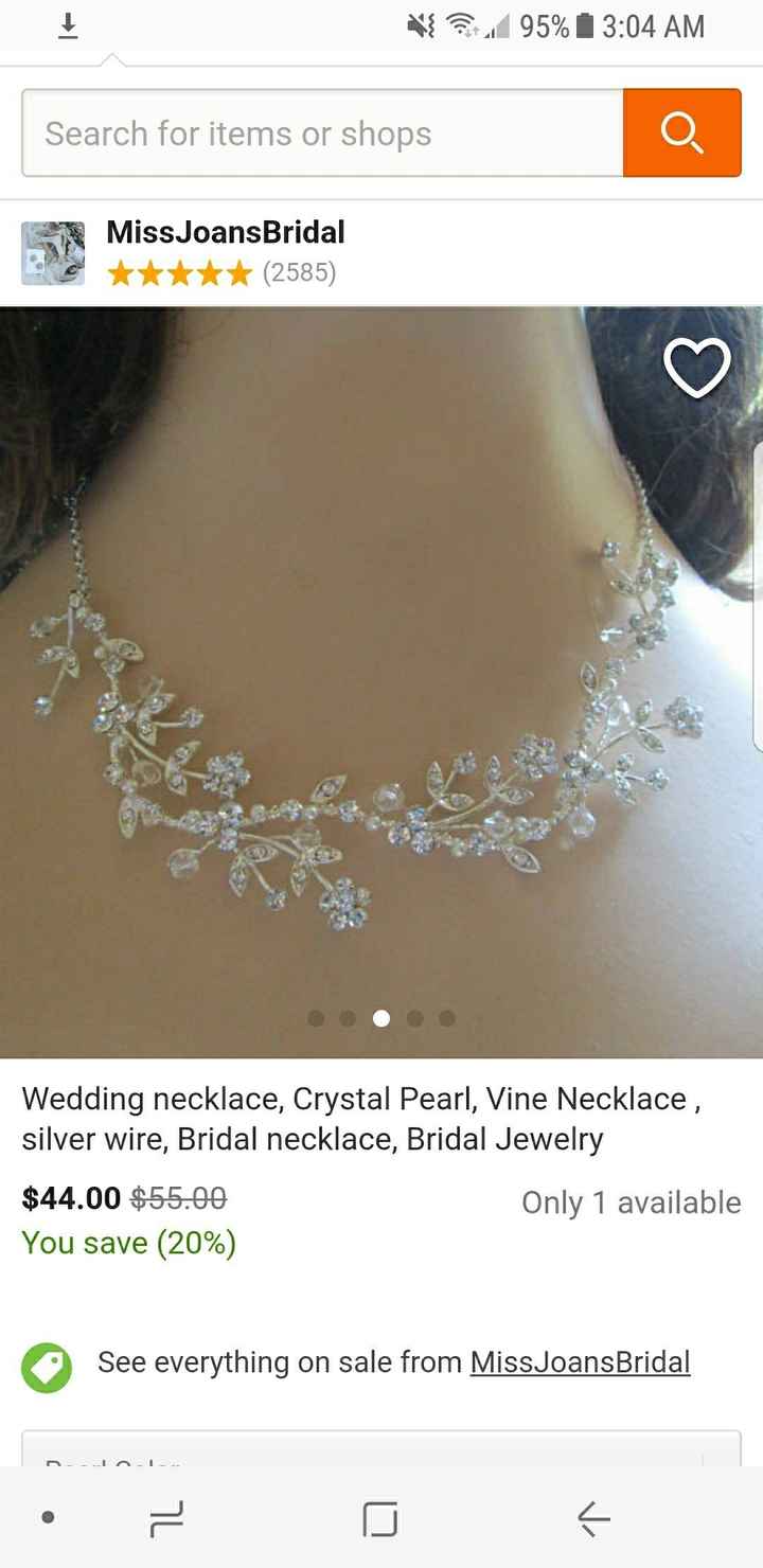 What do you think of my wedding dress?